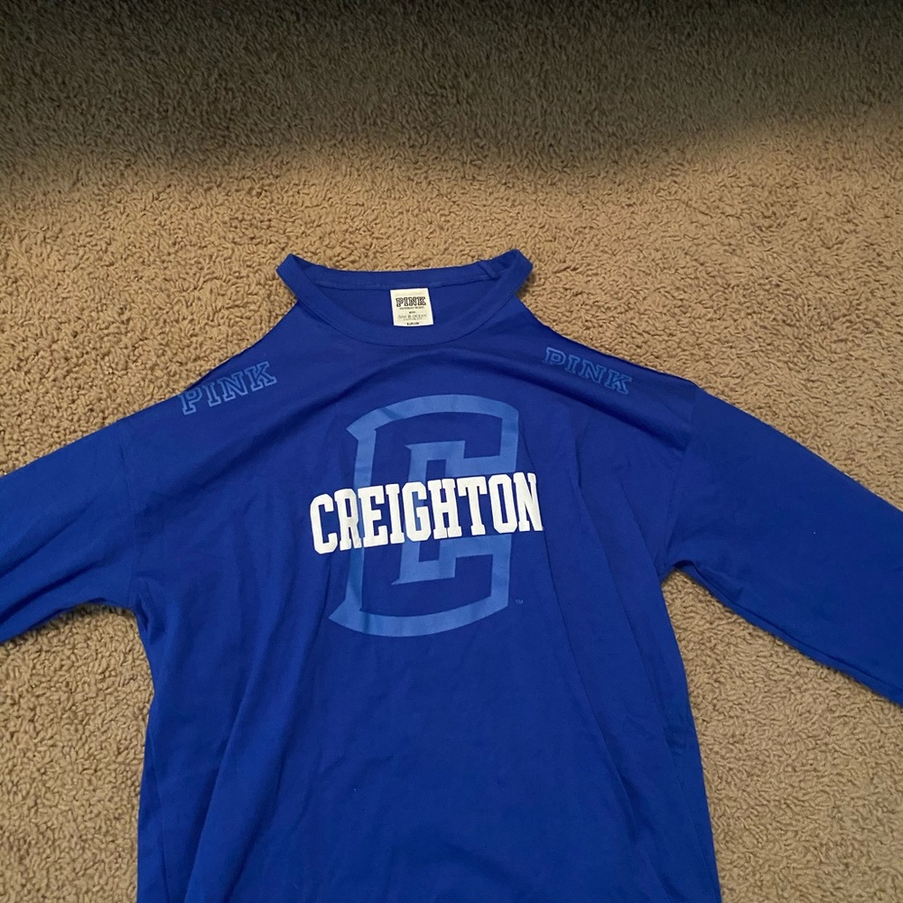Creighton cold shoulder shirt.